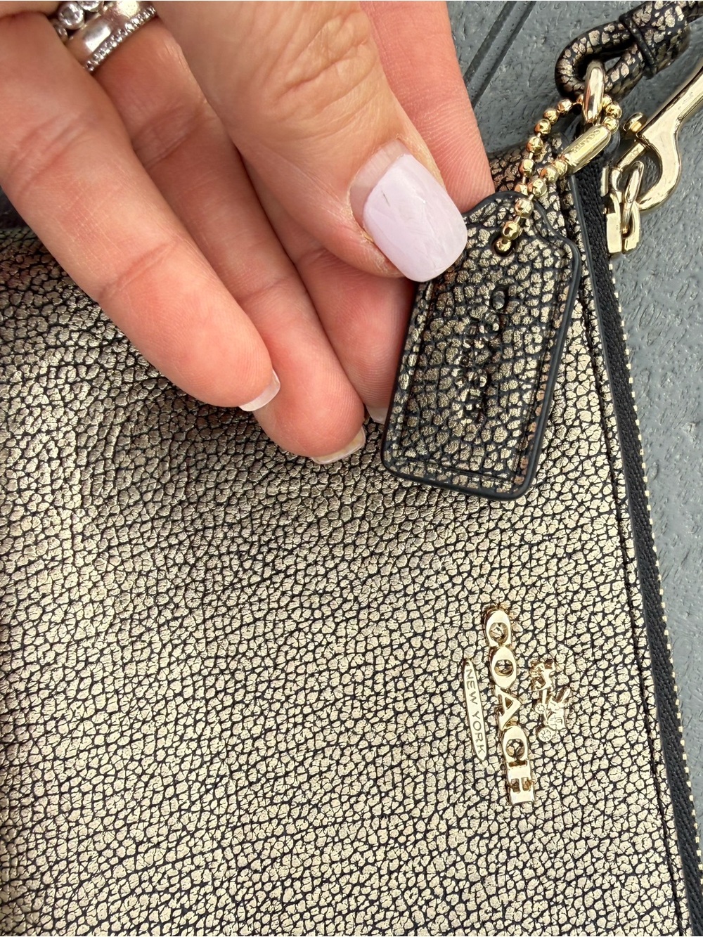 Coach Metallic Silver Pebbled Leather Wristlet - Picture 2 of 6